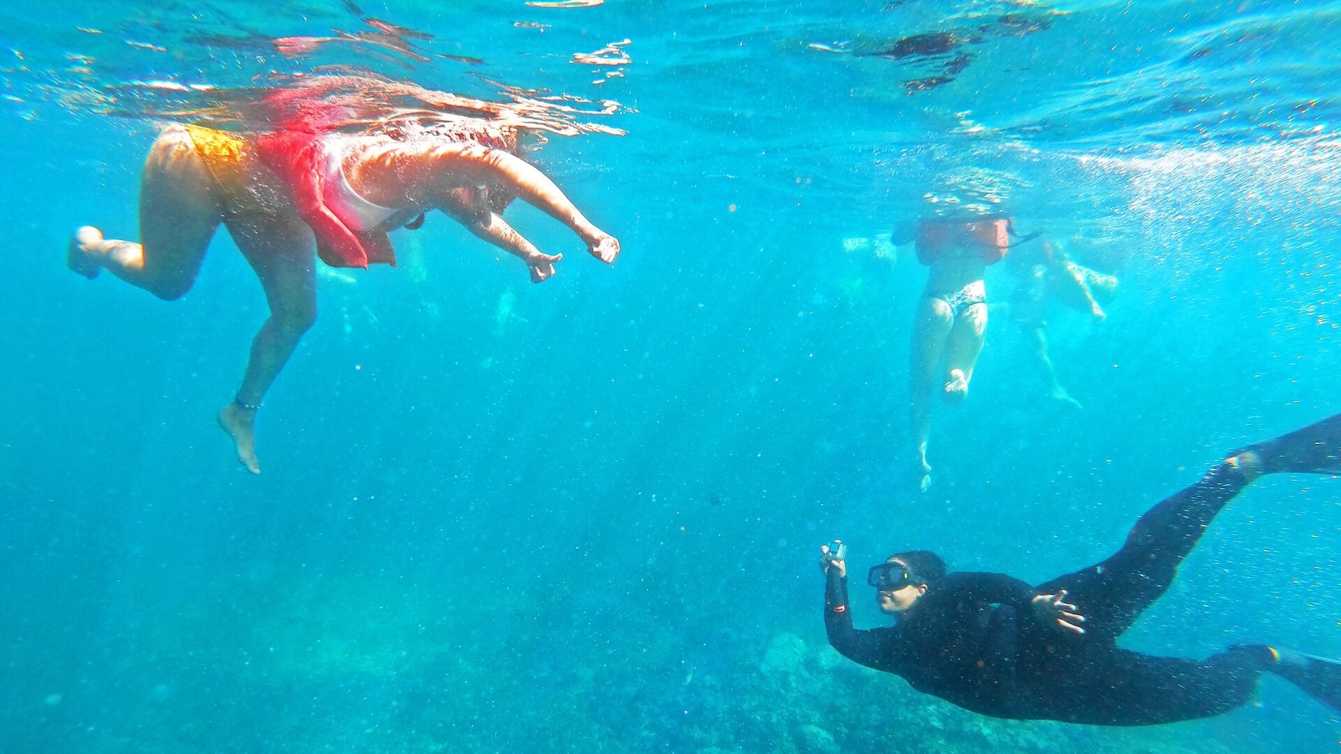 people diving in los arcos national park then to las animas